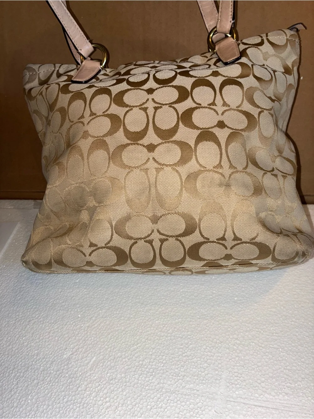 COACH Beige Signature Tote with Teal Center Stripe.